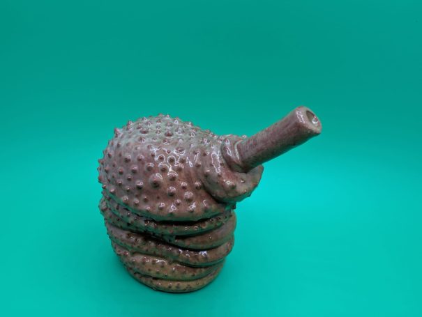 Ceramic Sculpture - a rough shelled creature with proboscis  