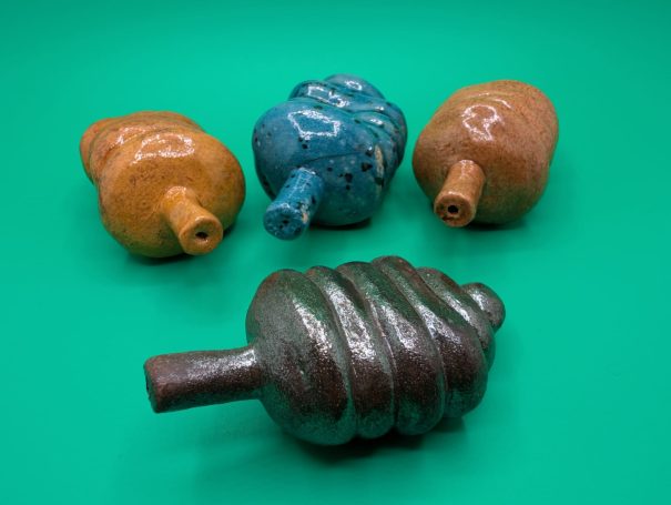 Ceramic sculptures - Four multicoloured 'worm' creatures with proboscis