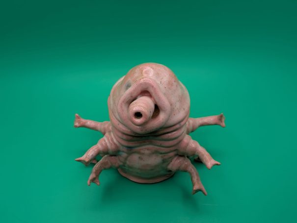 A pink standing tardigrade