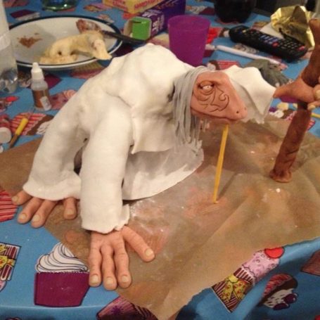 Chocolate clay Mystic wearing a fondant icing robe