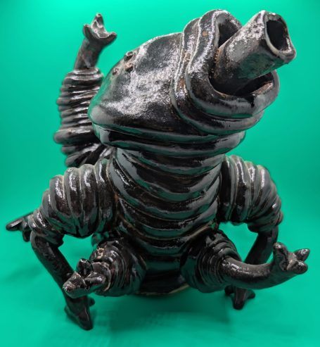 A large standing tardigrade is crouched, tasting the air, as if ready to spring into action if required 